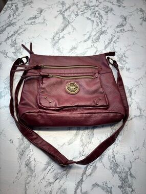 Stone & Co. Burgundy Leather Crossbody Bag with Brass Emblem